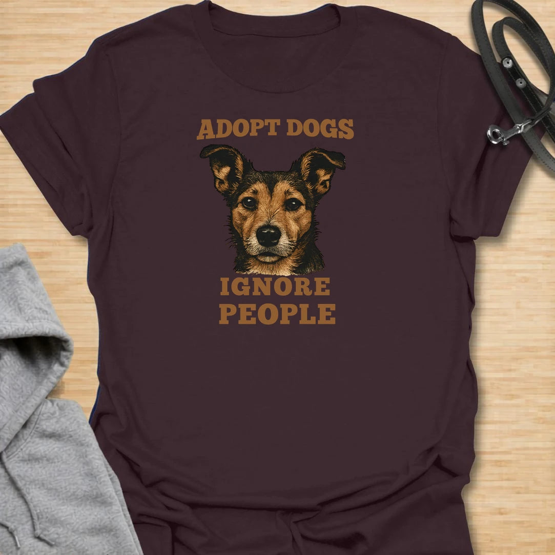 This adopt dogs ignore people t-shirt is perfect for rescue dog lovers with a strong sense of humor. The bold vintage-style text and loyal dog portrait make the design simple, readable, and full of personality. It is a great choice for dog moms, dog dads, rescue supporters, and anyone who would rather spend time with dogs than deal with people. A fun everyday shirt for shelter volunteers, adopters, foster families, and proud dog people who believe rescue dogs deserve all the attention.