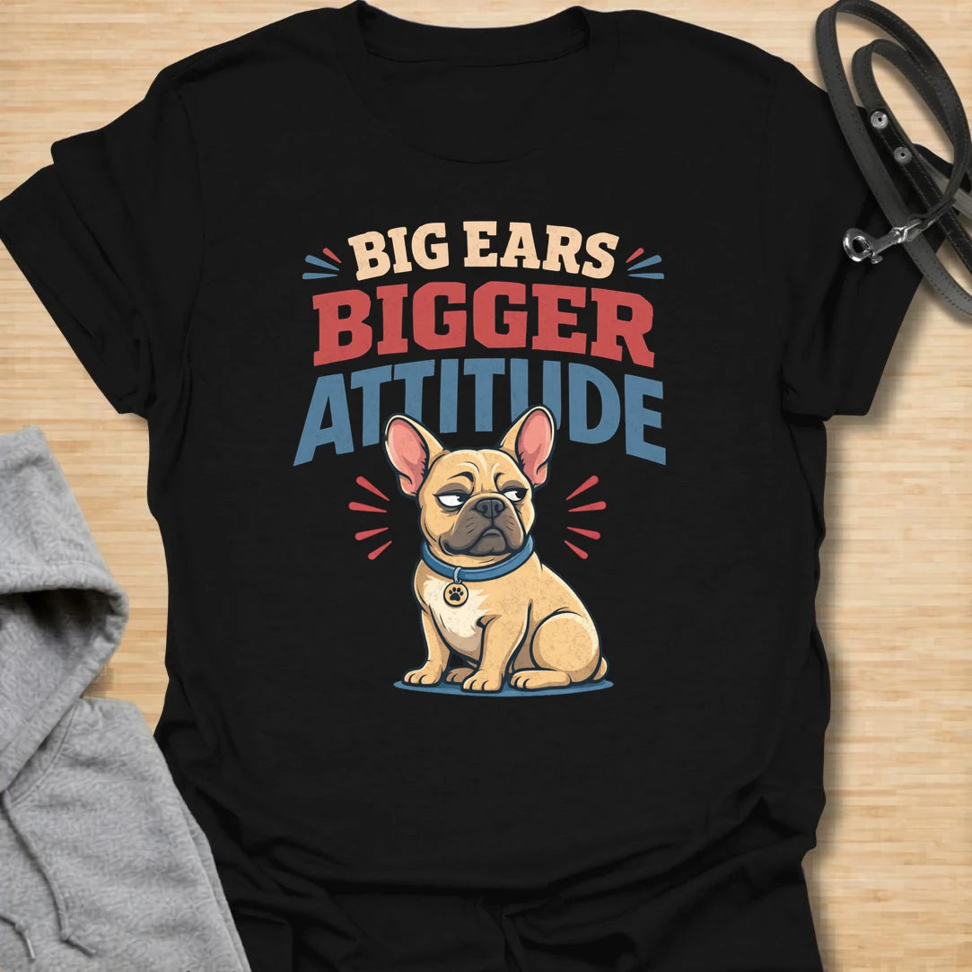 This Big Ears Bigger Attitude t-shirt is made for French Bulldog lovers who know those famous bat ears come with plenty of sass. Featuring bold retro lettering, a grumpy cartoon Frenchie, and a funny breed-specific message, this design has a playful dog-parent feel that Frenchie owners will instantly understand. Perfect for Frenchie moms, Frenchie dads, French Bulldog owners, rescue dog lovers, and anyone whose small dog has a seriously big personality.