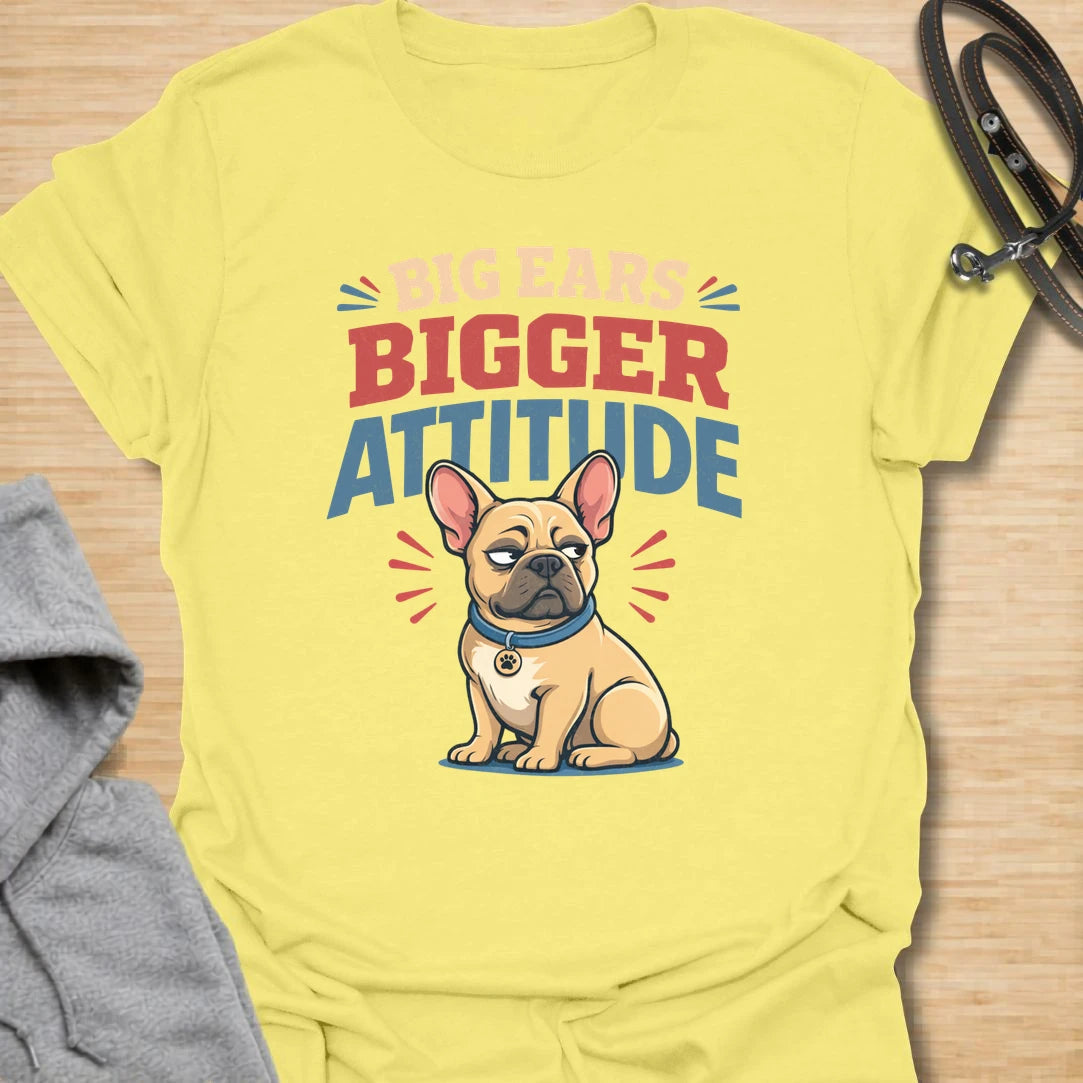 This Big Ears Bigger Attitude t-shirt is made for French Bulldog lovers who know those famous bat ears come with plenty of sass. Featuring bold retro lettering, a grumpy cartoon Frenchie, and a funny breed-specific message, this design has a playful dog-parent feel that Frenchie owners will instantly understand. Perfect for Frenchie moms, Frenchie dads, French Bulldog owners, rescue dog lovers, and anyone whose small dog has a seriously big personality.