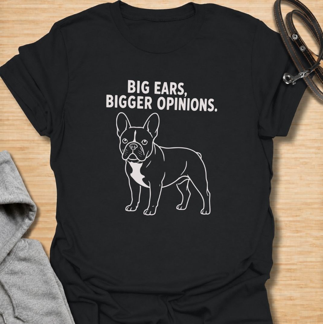Big ears come with even bigger opinions. This funny French Bulldog T-shirt features a clean line-art Frenchie with the bold phrase “Big Ears, Bigger Opinions.” A simple, wearable design for Frenchie moms, Frenchie dads, and anyone who knows these compact dogs are never short of personality.
