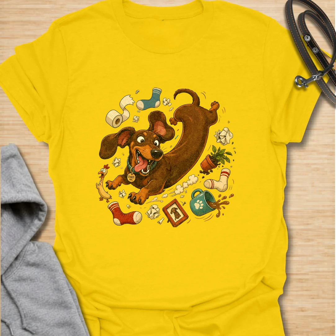 Funny dachshund t-shirt featuring a wild and mischievous doxie surrounded by total household chaos. The “Chaos Reigns” design is perfect for dachshund owners who know these little dogs may be small, but they bring huge personality, energy, and trouble wherever they go. With its playful artwork and humorous theme, this shirt is a great fit for dog moms, dog dads, and anyone obsessed with funny wiener dog apparel. It also makes a great gift for dachshund lovers who appreciate the messy, lovable, and completel