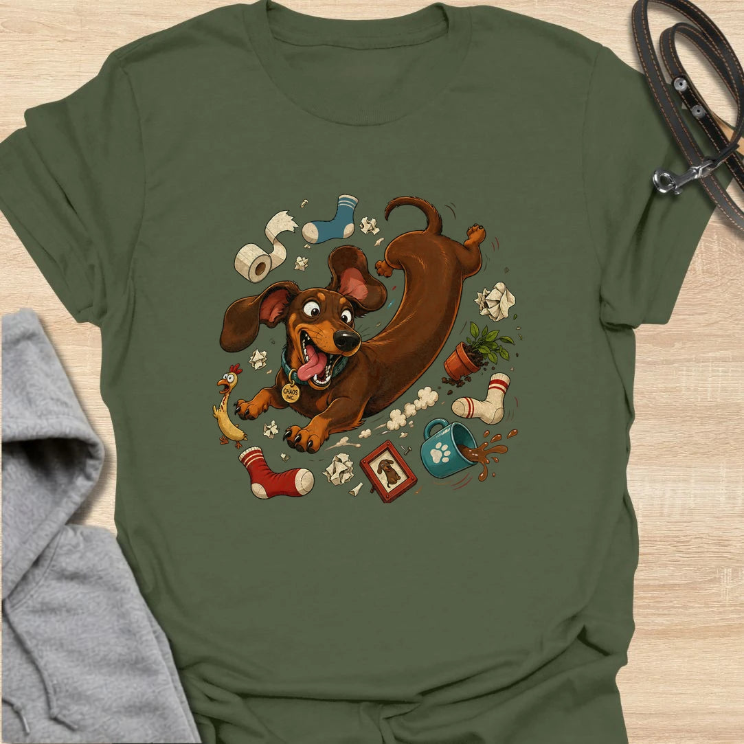 Funny dachshund t-shirt featuring a wild and mischievous doxie surrounded by total household chaos. The “Chaos Reigns” design is perfect for dachshund owners who know these little dogs may be small, but they bring huge personality, energy, and trouble wherever they go. With its playful artwork and humorous theme, this shirt is a great fit for dog moms, dog dads, and anyone obsessed with funny wiener dog apparel. It also makes a great gift for dachshund lovers who appreciate the messy, lovable, and completel