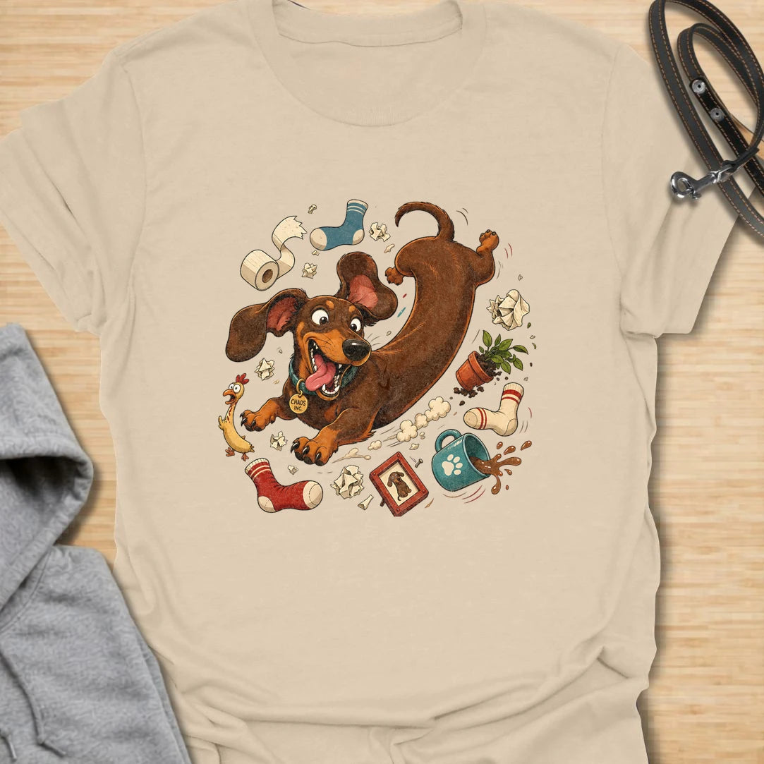 Funny dachshund t-shirt featuring a wild and mischievous doxie surrounded by total household chaos. The “Chaos Reigns” design is perfect for dachshund owners who know these little dogs may be small, but they bring huge personality, energy, and trouble wherever they go. With its playful artwork and humorous theme, this shirt is a great fit for dog moms, dog dads, and anyone obsessed with funny wiener dog apparel. It also makes a great gift for dachshund lovers who appreciate the messy, lovable, and completel