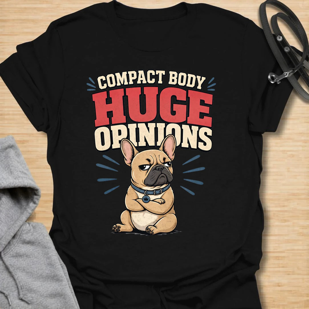This Compact Body Huge Opinions t-shirt is made for French Bulldog lovers who know their little dog has no shortage of attitude. Featuring a grumpy cartoon Frenchie with folded arms, bold retro lettering, and a funny breed-specific message, this design has a playful dog-parent feel that Frenchie owners will instantly understand. Perfect for Frenchie moms, Frenchie dads, French Bulldog owners, rescue dog lovers, and anyone whose small dog has a very big personality.