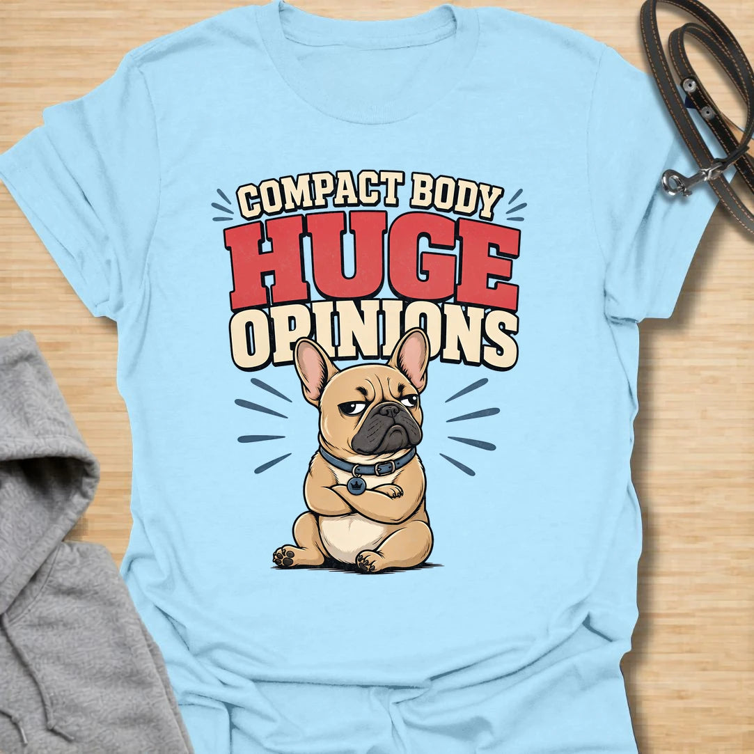 This Compact Body Huge Opinions t-shirt is made for French Bulldog lovers who know their little dog has no shortage of attitude. Featuring a grumpy cartoon Frenchie with folded arms, bold retro lettering, and a funny breed-specific message, this design has a playful dog-parent feel that Frenchie owners will instantly understand. Perfect for Frenchie moms, Frenchie dads, French Bulldog owners, rescue dog lovers, and anyone whose small dog has a very big personality.