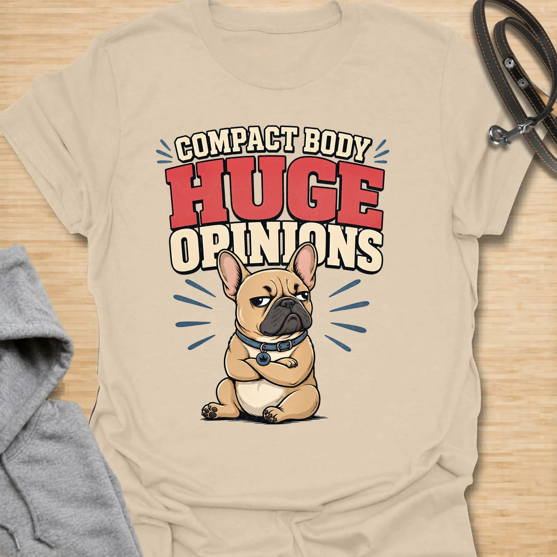 This Compact Body Huge Opinions t-shirt is made for French Bulldog lovers who know their little dog has no shortage of attitude. Featuring a grumpy cartoon Frenchie with folded arms, bold retro lettering, and a funny breed-specific message, this design has a playful dog-parent feel that Frenchie owners will instantly understand. Perfect for Frenchie moms, Frenchie dads, French Bulldog owners, rescue dog lovers, and anyone whose small dog has a very big personality.