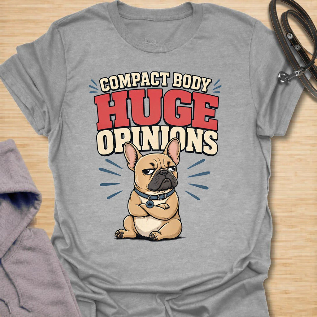 This Compact Body Huge Opinions t-shirt is made for French Bulldog lovers who know their little dog has no shortage of attitude. Featuring a grumpy cartoon Frenchie with folded arms, bold retro lettering, and a funny breed-specific message, this design has a playful dog-parent feel that Frenchie owners will instantly understand. Perfect for Frenchie moms, Frenchie dads, French Bulldog owners, rescue dog lovers, and anyone whose small dog has a very big personality.