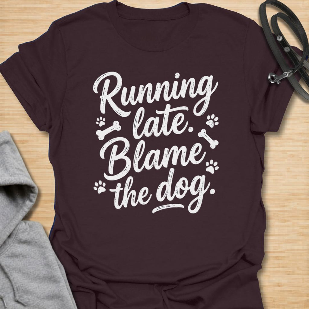 Funny dog lover t-shirt featuring the phrase “Running late. Blame the dog.” A perfect tee for dog moms, dog dads, rescue dog owners, and pet parents who know dogs always come first.