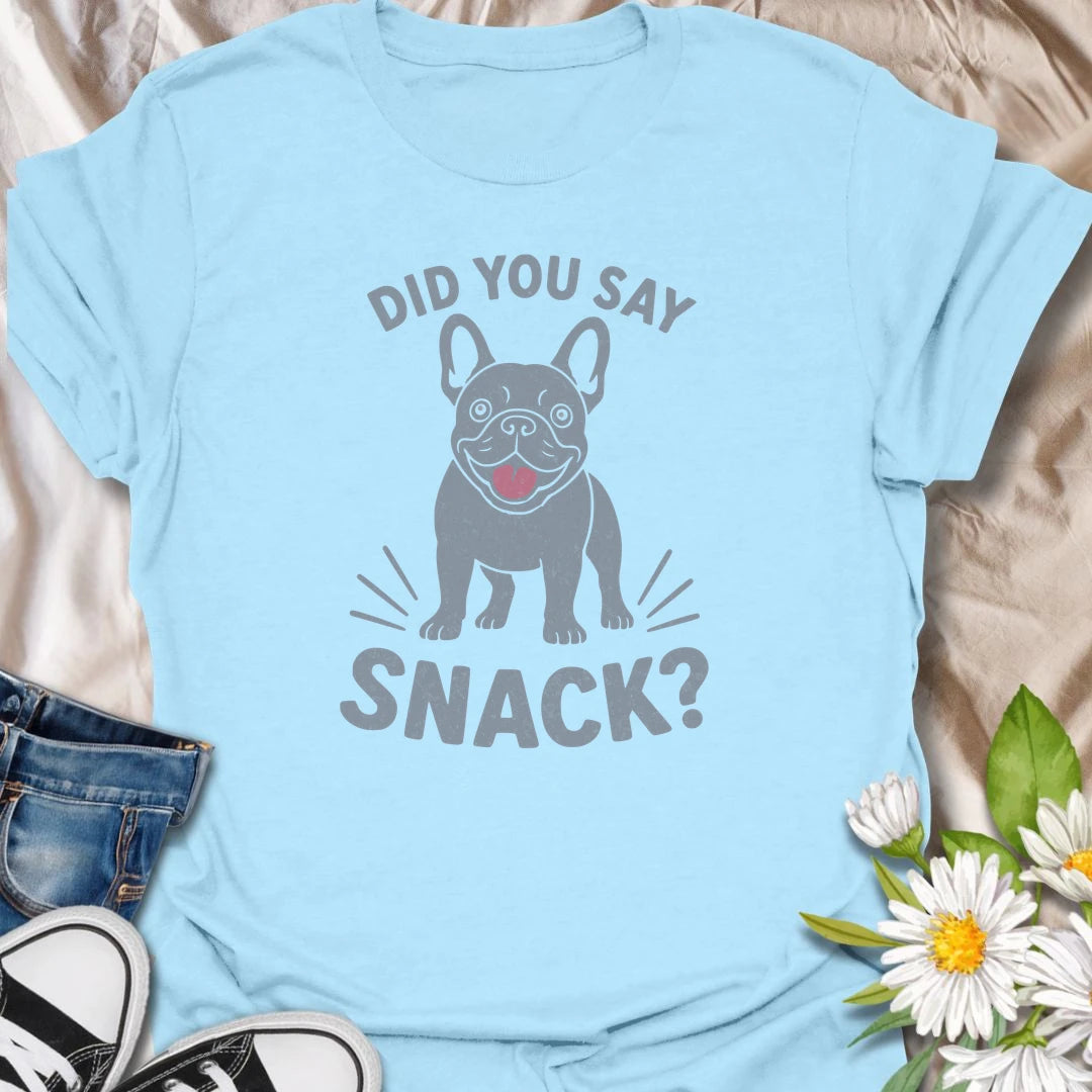 Few words get a French Bulldog’s attention faster than “snack.” This funny Frenchie T-shirt features an eager dog ready to investigate every possible treat opportunity. A playful gift for French Bulldog owners who know snacks are always the highest priority.