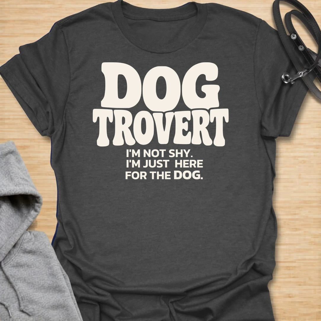 This Dogtrovert t-shirt is made for dog lovers who are not shy, they are simply more interested in the dog. Featuring bold retro typography and the phrase I’m not shy, I’m just here for the dog, this design has a funny, relatable feel for introverted dog people. Perfect for dog moms, dog dads, rescue dog owners, pet parents, introverts, and anyone who would rather make friends with the dog first. Charcoal