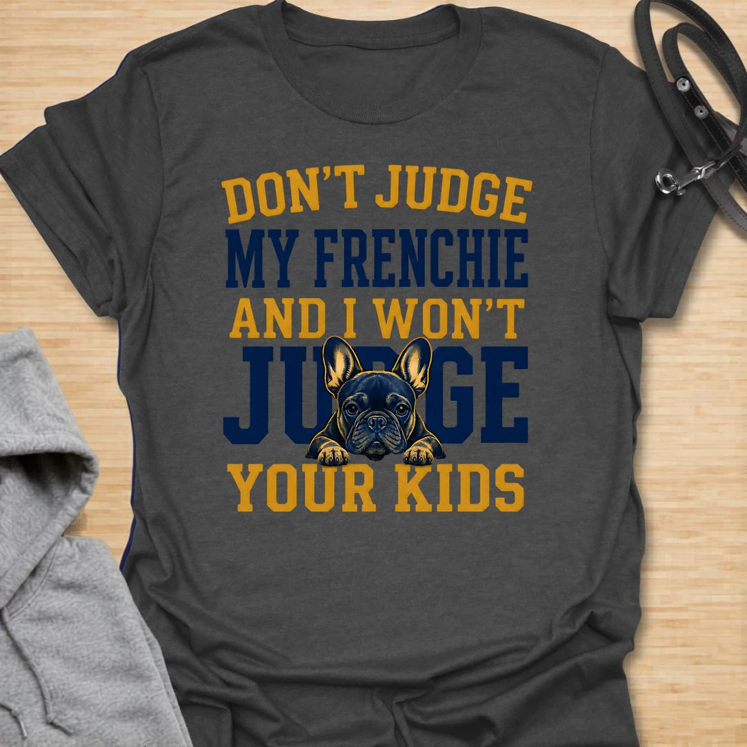 This Don’t Judge My Frenchie t-shirt is made for French Bulldog lovers who know their little dog may be chaotic, but judgment goes both ways. Featuring bold varsity-style lettering and a serious Frenchie peeking through the text, this design has a funny, protective dog-parent feel that Frenchie owners will instantly understand. Perfect for Frenchie moms, Frenchie dads, French Bulldog owners, rescue dog lovers, and anyone who knows their dog’s behavior is not up for discussion.