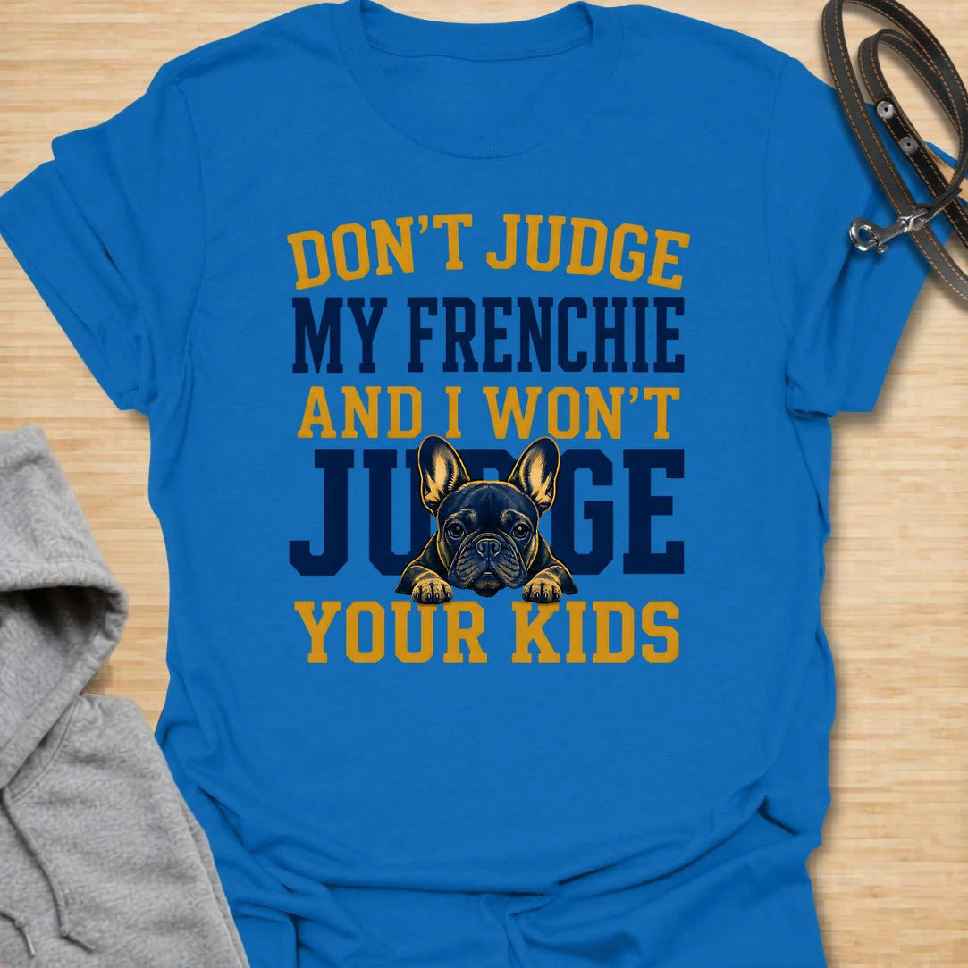 This Don’t Judge My Frenchie t-shirt is made for French Bulldog lovers who know their little dog may be chaotic, but judgment goes both ways. Featuring bold varsity-style lettering and a serious Frenchie peeking through the text, this design has a funny, protective dog-parent feel that Frenchie owners will instantly understand. Perfect for Frenchie moms, Frenchie dads, French Bulldog owners, rescue dog lovers, and anyone who knows their dog’s behavior is not up for discussion.