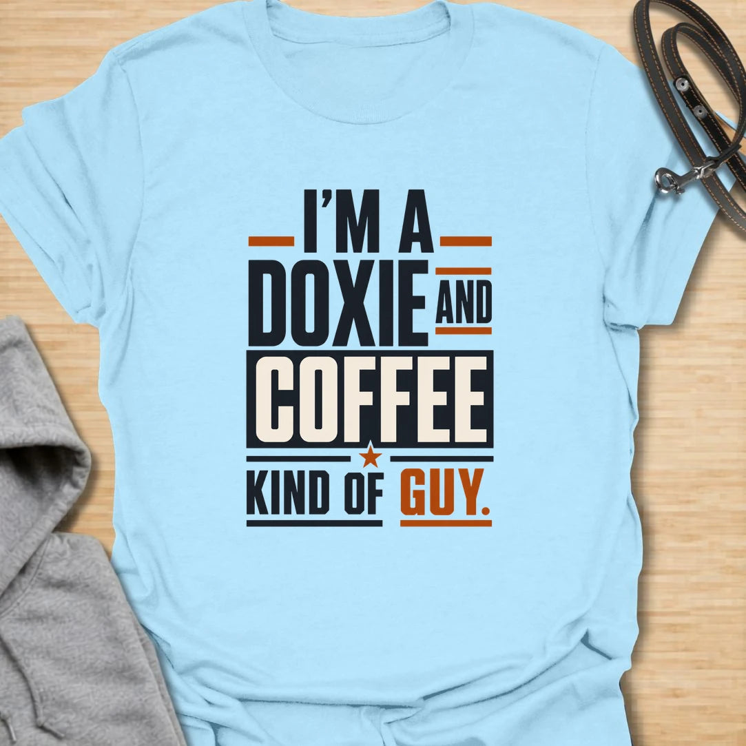Funny doxie and coffee t-shirt for guys who love dachshunds, caffeine, and simple dog dad style. This bold typography design is perfect for dachshund dads, coffee lovers, dog owners, and anyone whose day starts better with a cup of coffee and a doxie nearby. Also available in a matching girl version, making it a fun couple shirt set for dog-loving coffee drinkers. Great for casual wear, dog walks, coffee runs, weekends, or gifting to a dachshund lover.