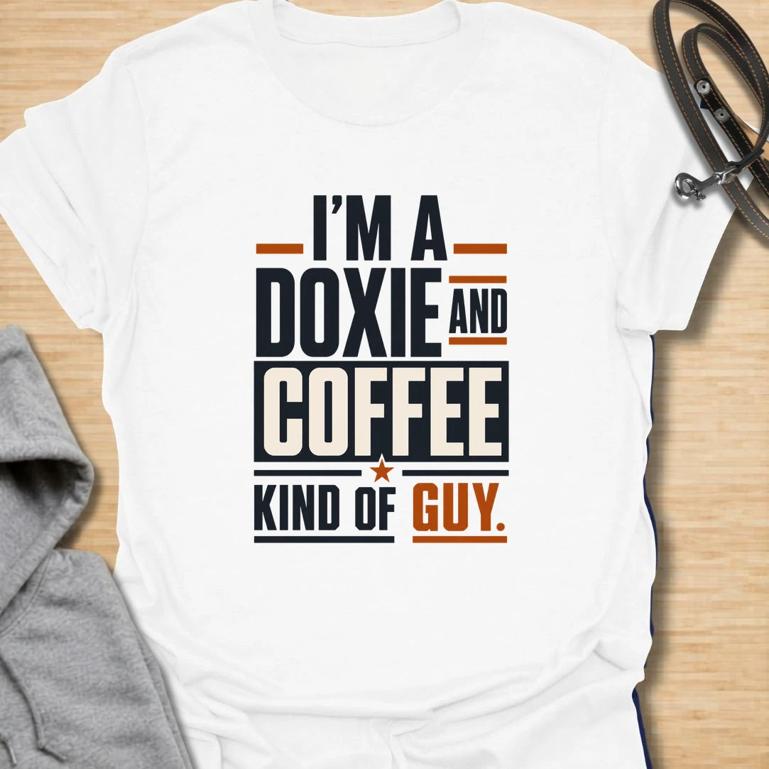 Funny doxie and coffee t-shirt for guys who love dachshunds, caffeine, and simple dog dad style. This bold typography design is perfect for dachshund dads, coffee lovers, dog owners, and anyone whose day starts better with a cup of coffee and a doxie nearby. Also available in a matching girl version, making it a fun couple shirt set for dog-loving coffee drinkers. Great for casual wear, dog walks, coffee runs, weekends, or gifting to a dachshund lover.