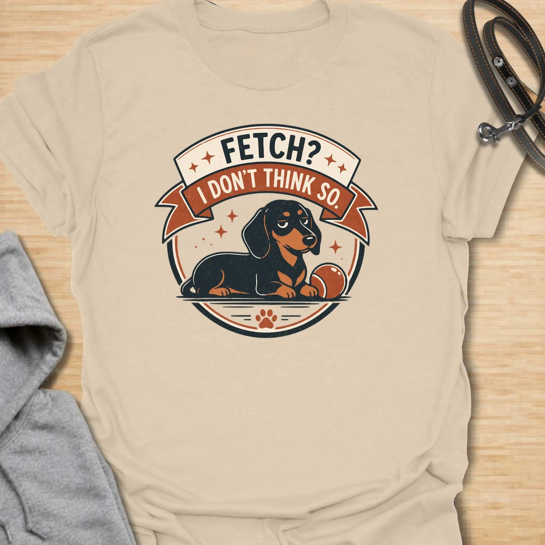 Fetch No Thanks t-shirt for dachshund lovers who know their doxie has absolutely no interest in following commands. This retro badge-style design features a laid-back dachshund and the phrase “Fetch? I Don’t Think So.” Perfect for sausage dog owners, stubborn dog fans, and anyone with a doxie who prefers doing things their own way.