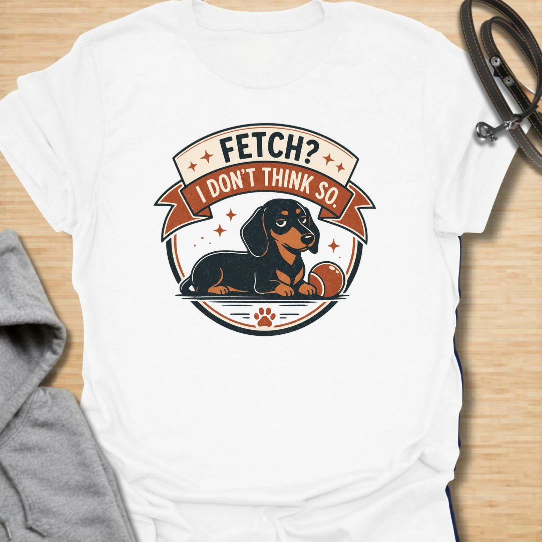 Fetch No Thanks t-shirt for dachshund lovers who know their doxie has absolutely no interest in following commands. This retro badge-style design features a laid-back dachshund and the phrase “Fetch? I Don’t Think So.” Perfect for sausage dog owners, stubborn dog fans, and anyone with a doxie who prefers doing things their own way.