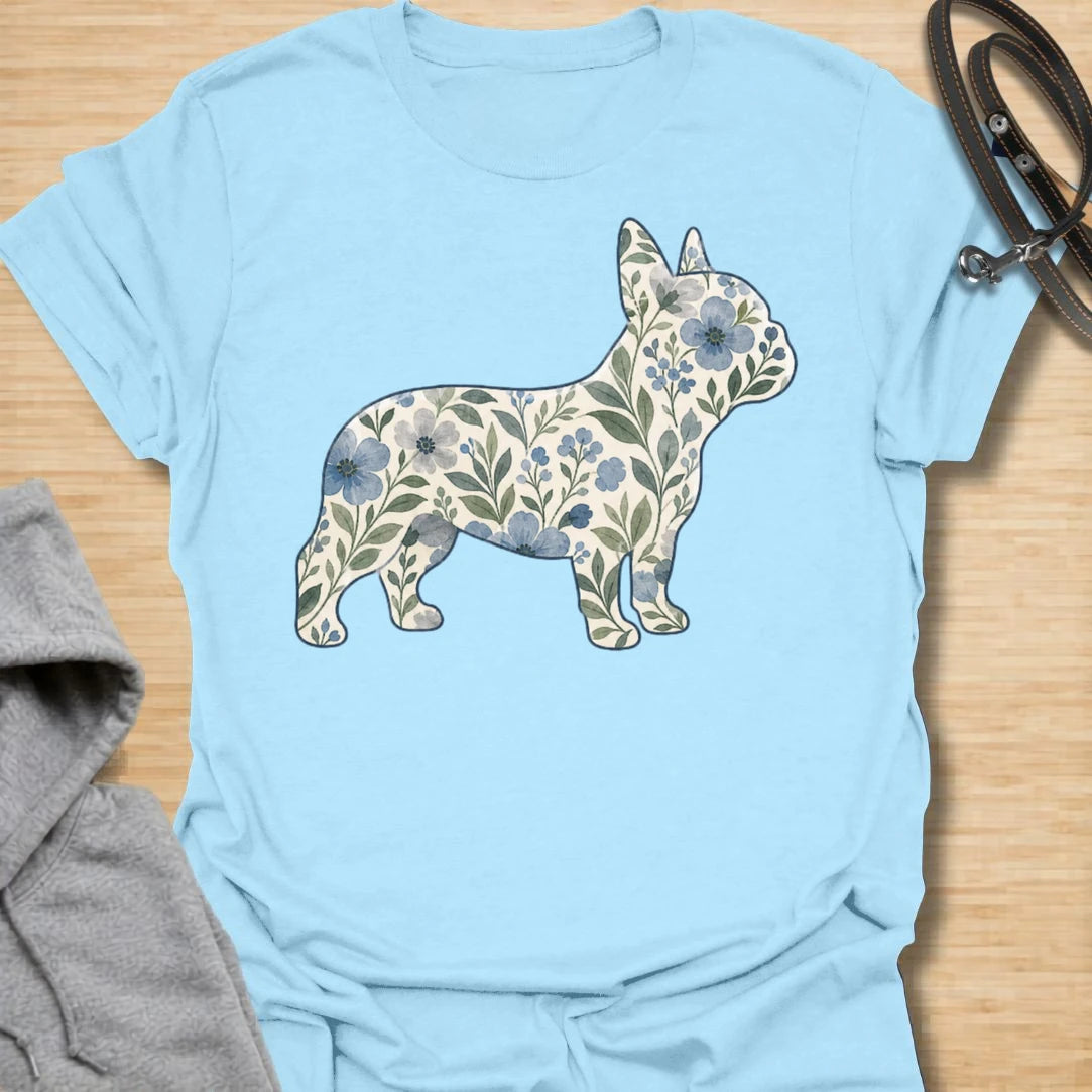 This Floral French Bulldog t-shirt is made for Frenchie lovers who want a softer, prettier take on their favorite little dog. Featuring a French Bulldog silhouette filled with delicate blue flowers, leafy vines, and botanical details, this design blends breed-specific charm with a calm floral style. Perfect for Frenchie moms, Frenchie dads, French Bulldog owners, flower lovers, botanical art fans, and anyone who loves dogs with a gentle garden-inspired twist.