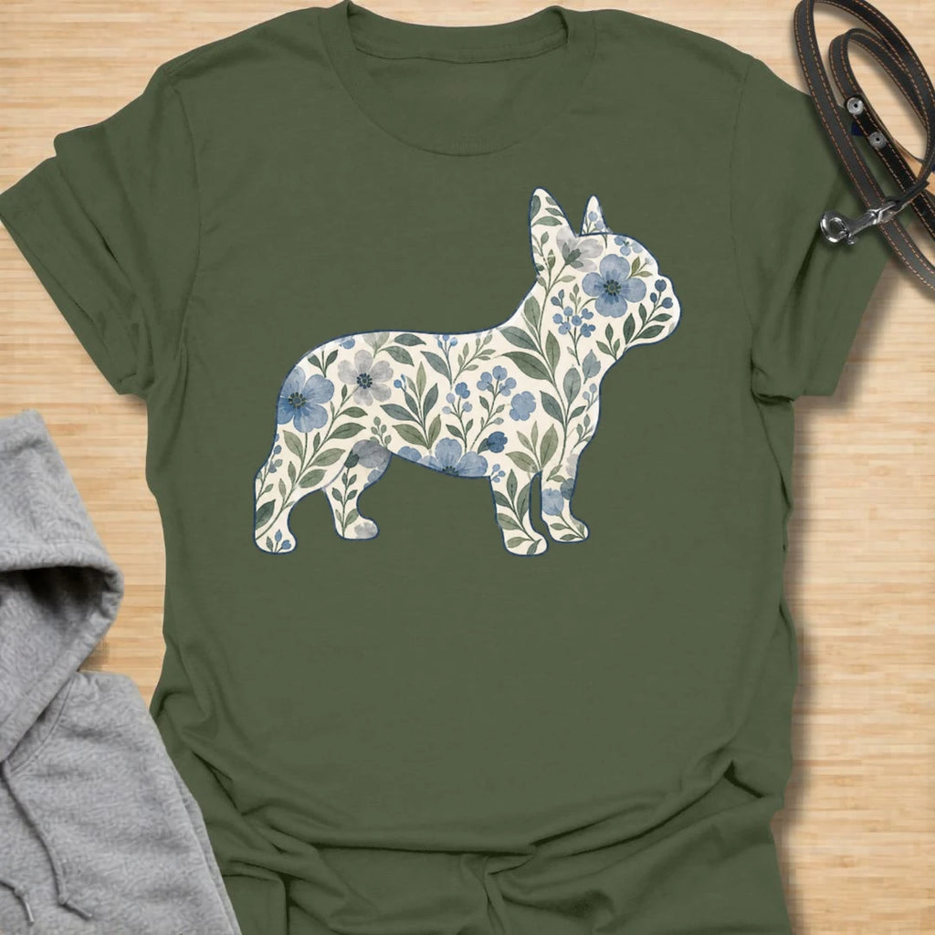 This Floral French Bulldog t-shirt is made for Frenchie lovers who want a softer, prettier take on their favorite little dog. Featuring a French Bulldog silhouette filled with delicate blue flowers, leafy vines, and botanical details, this design blends breed-specific charm with a calm floral style. Perfect for Frenchie moms, Frenchie dads, French Bulldog owners, flower lovers, botanical art fans, and anyone who loves dogs with a gentle garden-inspired twist.
