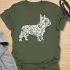 This Floral French Bulldog t-shirt is made for Frenchie lovers who want a softer, prettier take on their favorite little dog. Featuring a French Bulldog silhouette filled with delicate blue flowers, leafy vines, and botanical details, this design blends breed-specific charm with a calm floral style. Perfect for Frenchie moms, Frenchie dads, French Bulldog owners, flower lovers, botanical art fans, and anyone who loves dogs with a gentle garden-inspired twist.