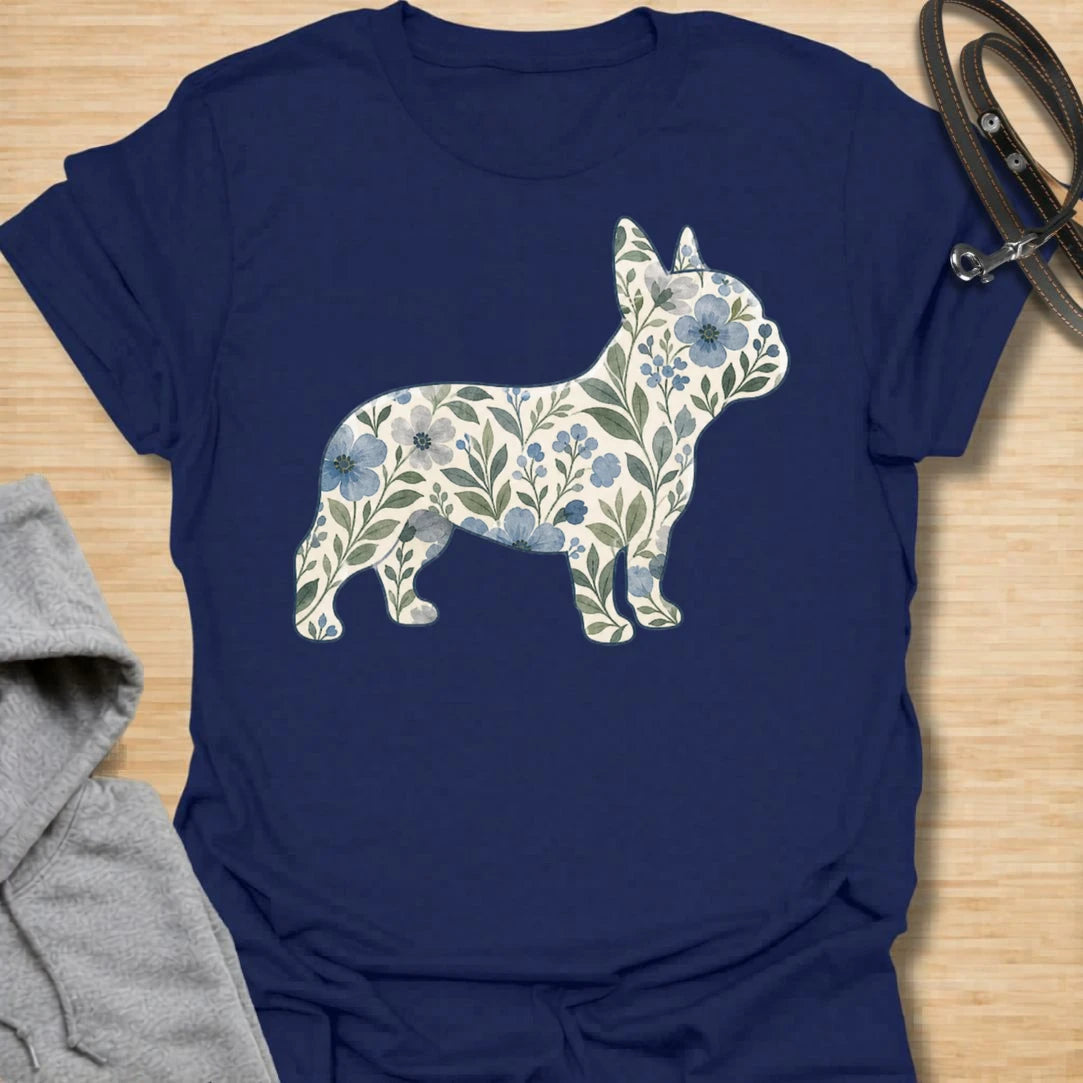 This Floral French Bulldog t-shirt is made for Frenchie lovers who want a softer, prettier take on their favorite little dog. Featuring a French Bulldog silhouette filled with delicate blue flowers, leafy vines, and botanical details, this design blends breed-specific charm with a calm floral style. Perfect for Frenchie moms, Frenchie dads, French Bulldog owners, flower lovers, botanical art fans, and anyone who loves dogs with a gentle garden-inspired twist.