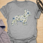 This Floral French Bulldog t-shirt is made for Frenchie lovers who want a softer, prettier take on their favorite little dog. Featuring a French Bulldog silhouette filled with delicate blue flowers, leafy vines, and botanical details, this design blends breed-specific charm with a calm floral style. Perfect for Frenchie moms, Frenchie dads, French Bulldog owners, flower lovers, botanical art fans, and anyone who loves dogs with a gentle garden-inspired twist.