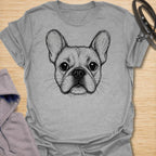 This French Bulldog Sketch t-shirt is made for Frenchie lovers who want a simple, artistic design focused on those unmistakable bat ears and expressive little face. Featuring a hand-drawn style French Bulldog portrait with fine sketch linework, this design has a clean, minimal dog-lover look that works for everyday wear. Perfect for Frenchie moms, Frenchie dads, French Bulldog owners, rescue dog lovers, and anyone who loves a classic breed-specific Frenchie graphic.