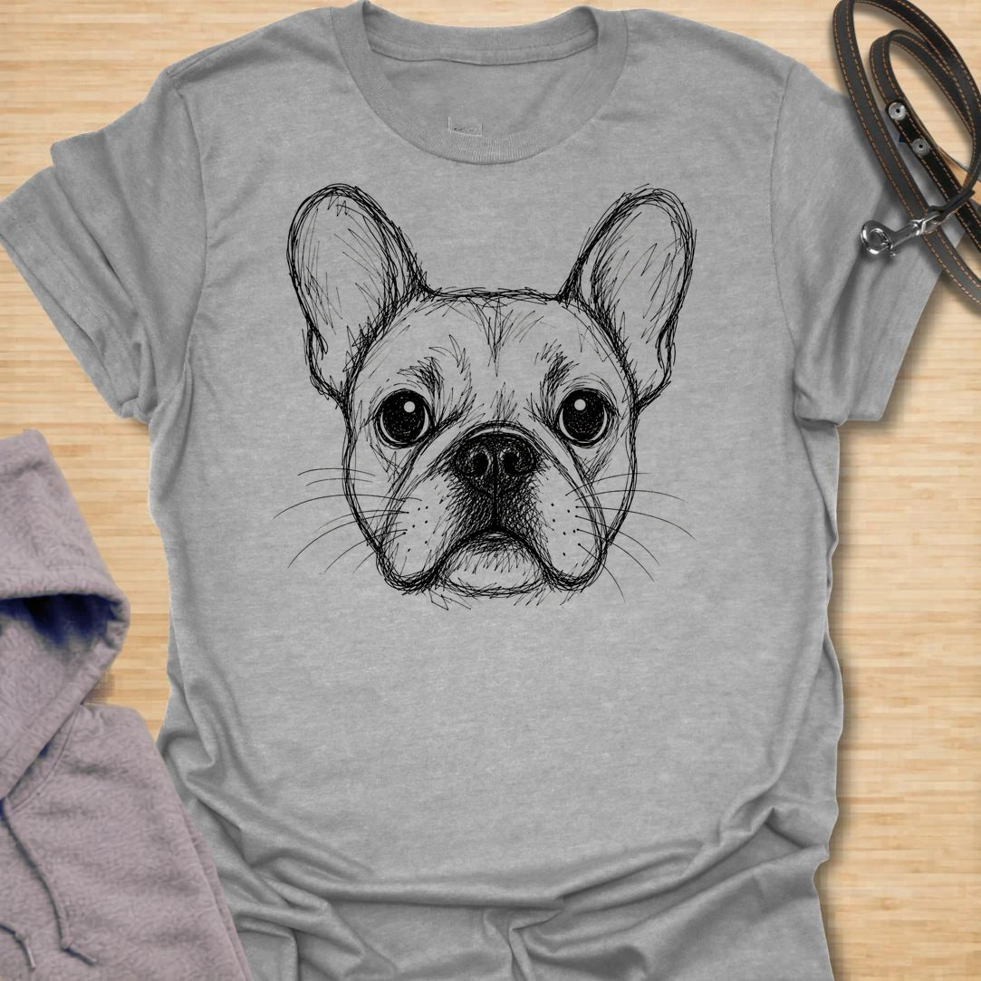 This French Bulldog Sketch t-shirt is made for Frenchie lovers who want a simple, artistic design focused on those unmistakable bat ears and expressive little face. Featuring a hand-drawn style French Bulldog portrait with fine sketch linework, this design has a clean, minimal dog-lover look that works for everyday wear. Perfect for Frenchie moms, Frenchie dads, French Bulldog owners, rescue dog lovers, and anyone who loves a classic breed-specific Frenchie graphic.
