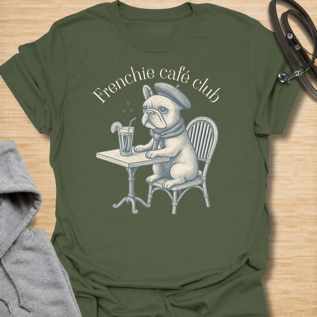 This Frenchie Café Club t-shirt is made for French Bulldog lovers who enjoy a little café charm with their dog-parent style. Featuring a vintage-style Frenchie sitting at a bistro table with a drink and beret, this design has a refined, playful feel with classic French café personality. Perfect for Frenchie moms, Frenchie dads, French Bulldog owners, coffee lovers, café fans, and anyone who loves their small dog with a side of attitude.