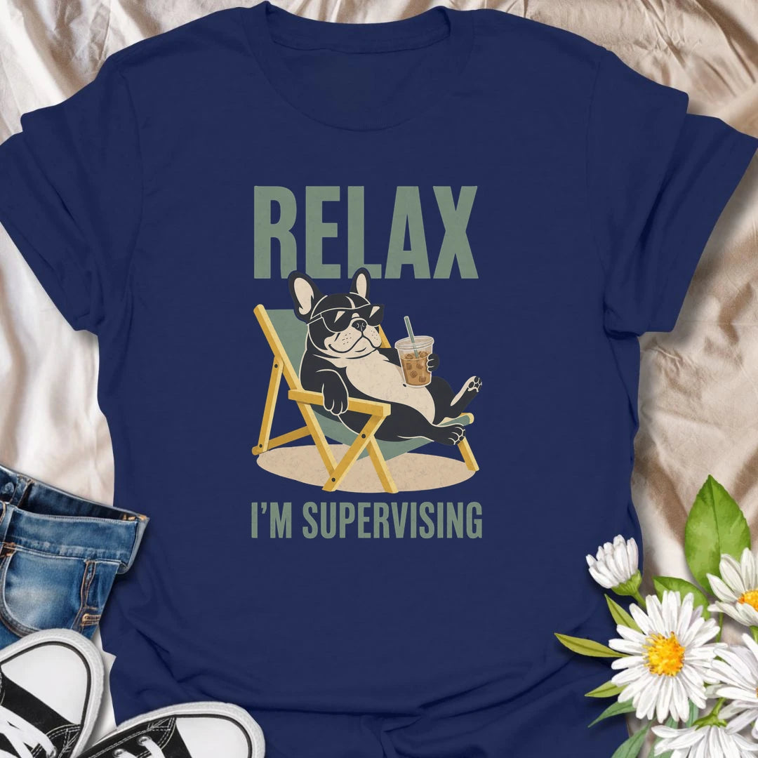 There is no need to worry when a French Bulldog is relaxing nearby and supervising absolutely everything. This funny Frenchie T-shirt features a laid-back bulldog enjoying an iced drink from the comfort of a chair. A playful gift for Frenchie owners who recognize expert-level lounging when they see it.