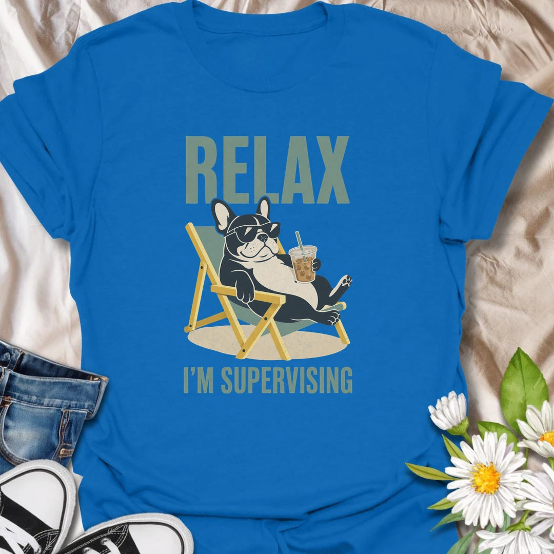 There is no need to worry when a French Bulldog is relaxing nearby and supervising absolutely everything. This funny Frenchie T-shirt features a laid-back bulldog enjoying an iced drink from the comfort of a chair. A playful gift for Frenchie owners who recognize expert-level lounging when they see it.