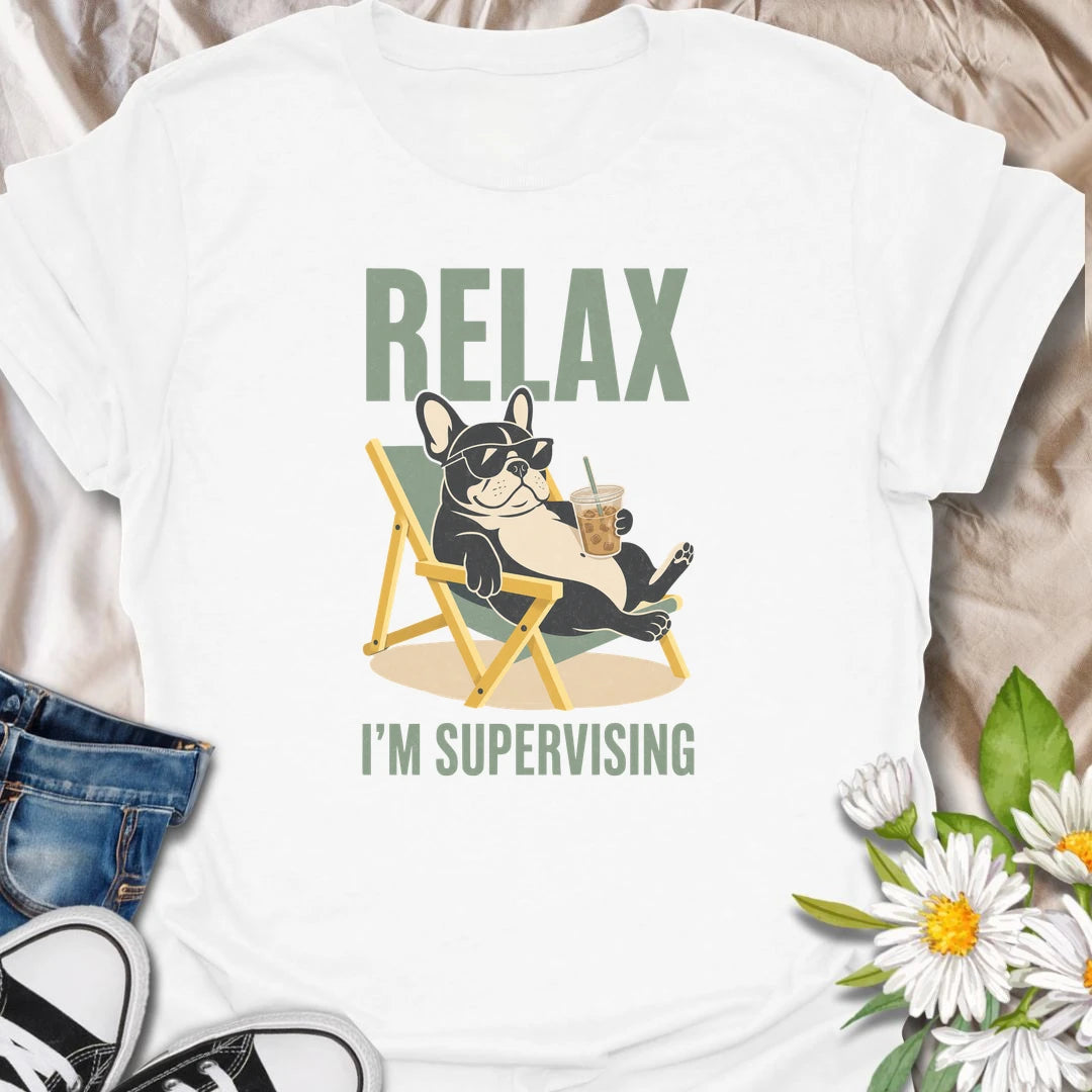 There is no need to worry when a French Bulldog is relaxing nearby and supervising absolutely everything. This funny Frenchie T-shirt features a laid-back bulldog enjoying an iced drink from the comfort of a chair. A playful gift for Frenchie owners who recognize expert-level lounging when they see it.