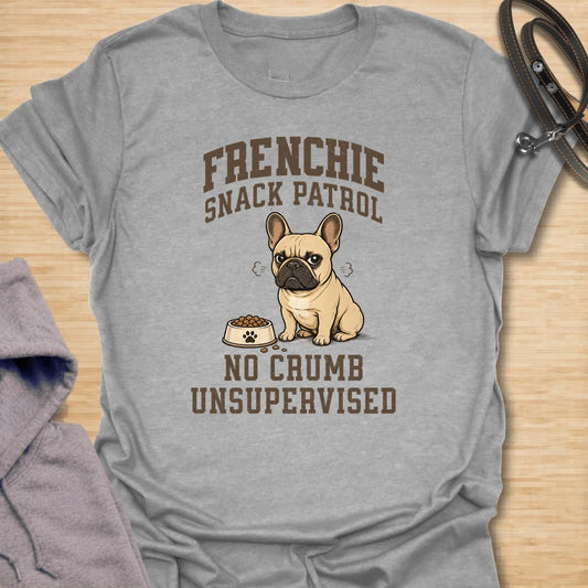 This Frenchie snack patrol t-shirt is a funny choice for anyone living with a food-obsessed French Bulldog. The grumpy Frenchie, full bowl, and bold varsity-style lettering make the design playful and easy to read. It is perfect for Frenchie moms, Frenchie dads, and dog lovers who know mealtime is taken very seriously. A great everyday shirt for casual wear, dog park visits, or gifting to someone whose French Bulldog monitors every crumb