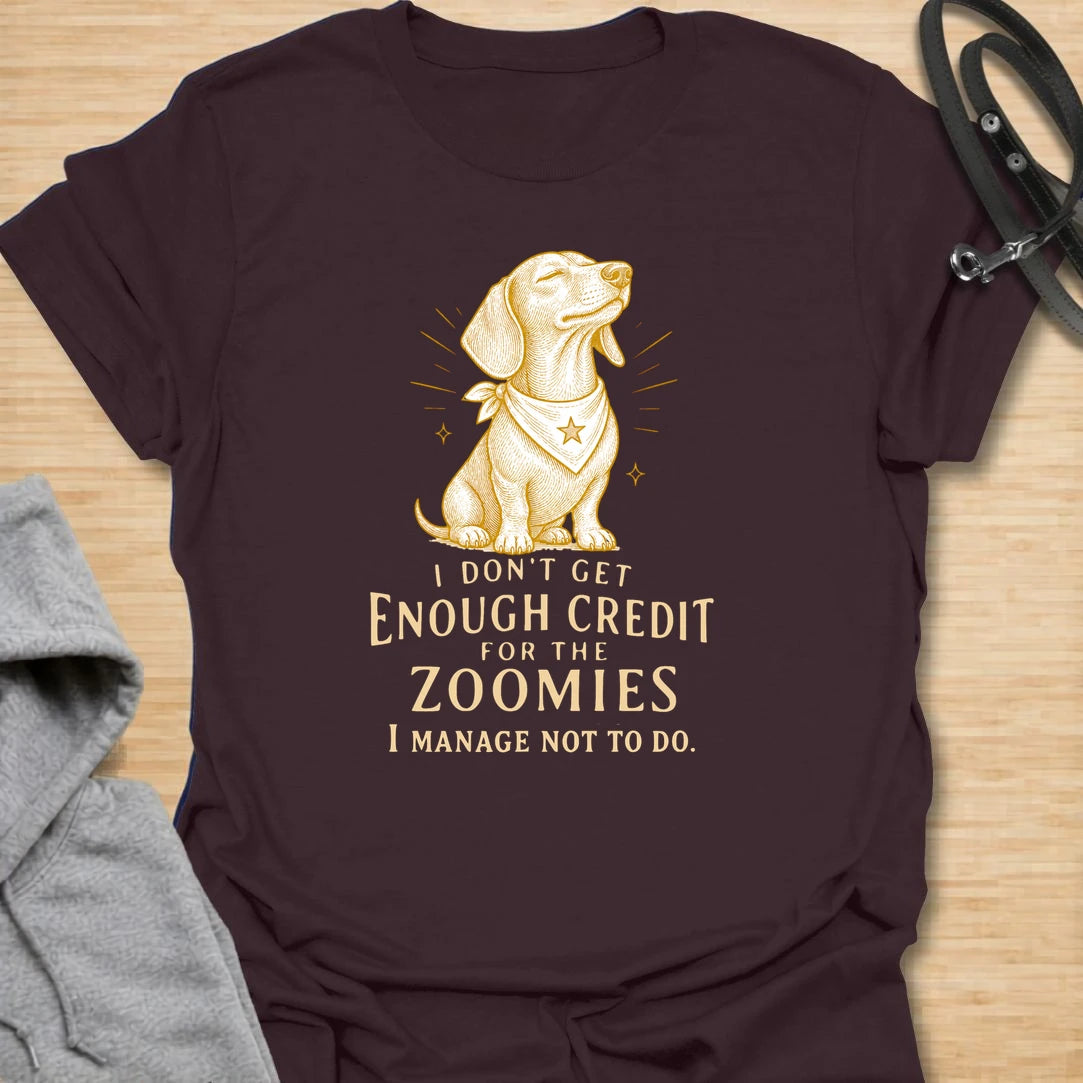 This I Don’t Get Enough Credit For The Zoomies t-shirt is made for dachshund lovers who know their little long dog is working very hard to stay calm. Featuring a proud dachshund in a bandana with vintage-style lettering and the funny phrase I Manage Not To Do, this design has a relatable dog-parent feel for anyone living with tiny legs and big energy. Perfect for dachshund moms, dachshund dads, wiener dog fans, rescue dog lovers, and anyone whose doxie deserves praise for every zoomie they resist.