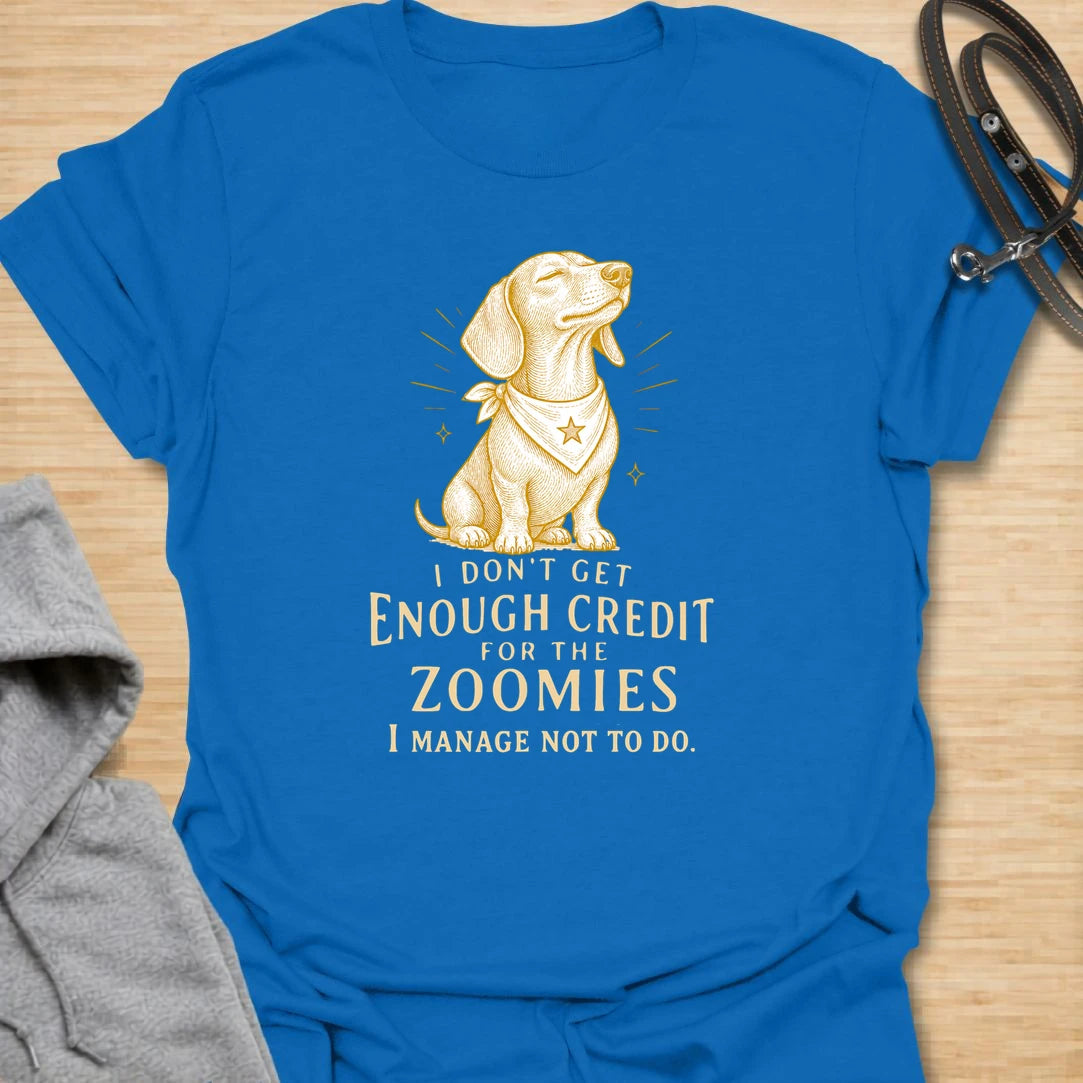 This I Don’t Get Enough Credit For The Zoomies t-shirt is made for dachshund lovers who know their little long dog is working very hard to stay calm. Featuring a proud dachshund in a bandana with vintage-style lettering and the funny phrase I Manage Not To Do, this design has a relatable dog-parent feel for anyone living with tiny legs and big energy. Perfect for dachshund moms, dachshund dads, wiener dog fans, rescue dog lovers, and anyone whose doxie deserves praise for every zoomie they resist.