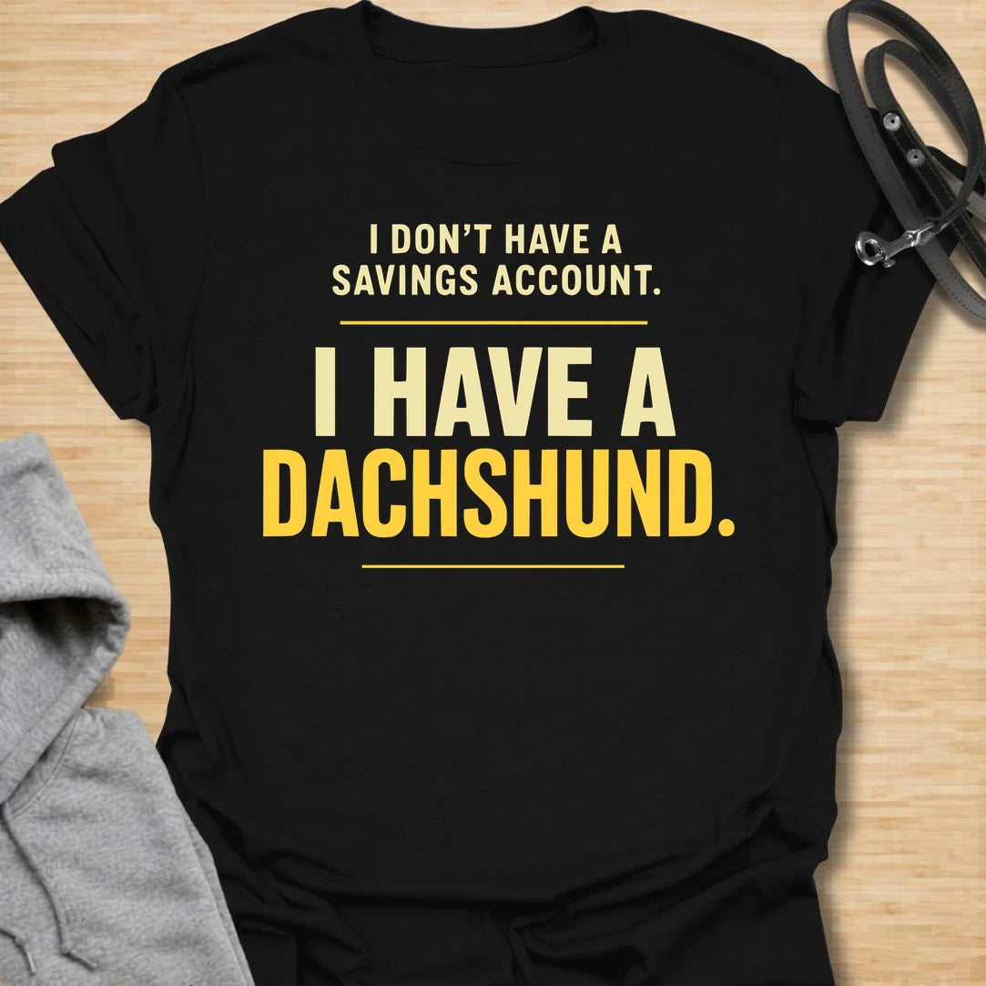 This I Don’t Have A Savings Account I Have A Dachshund t-shirt is made for doxie lovers who know exactly where their money goes. Featuring bold text-only typography with a funny dachshund-owner message, this design has a simple, relatable dog-parent feel that wiener dog fans will instantly understand. Perfect for dachshund moms, dachshund dads, doxie owners, rescue dog lovers, and anyone whose tiny long dog is basically their financial plan.