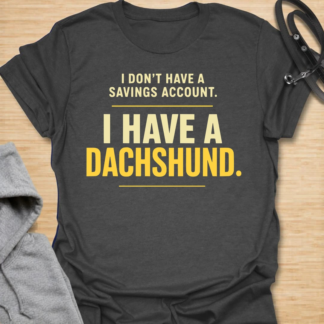 This I Don’t Have A Savings Account I Have A Dachshund t-shirt is made for doxie lovers who know exactly where their money goes. Featuring bold text-only typography with a funny dachshund-owner message, this design has a simple, relatable dog-parent feel that wiener dog fans will instantly understand. Perfect for dachshund moms, dachshund dads, doxie owners, rescue dog lovers, and anyone whose tiny long dog is basically their financial plan.
