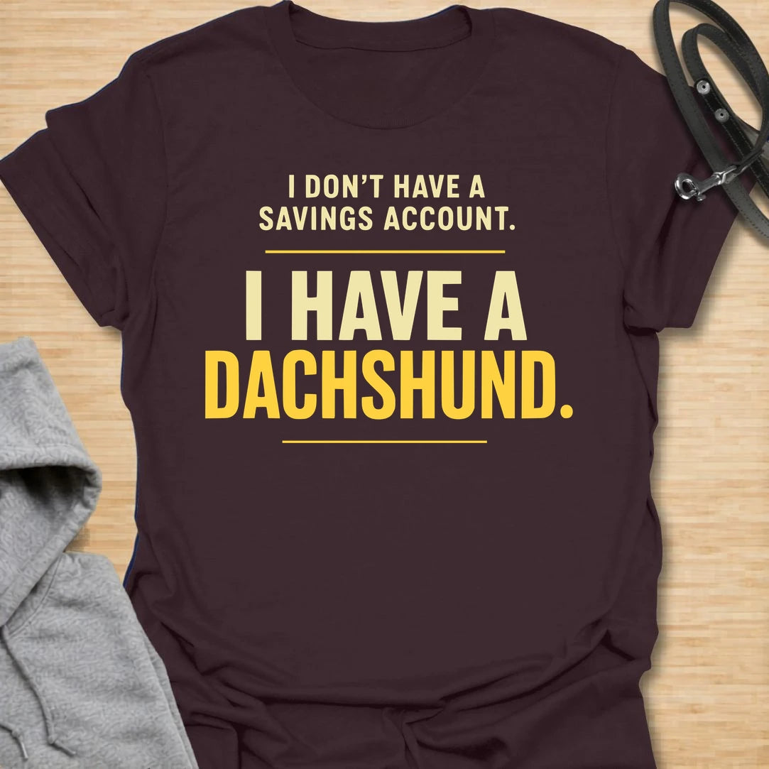 This I Don’t Have A Savings Account I Have A Dachshund t-shirt is made for doxie lovers who know exactly where their money goes. Featuring bold text-only typography with a funny dachshund-owner message, this design has a simple, relatable dog-parent feel that wiener dog fans will instantly understand. Perfect for dachshund moms, dachshund dads, doxie owners, rescue dog lovers, and anyone whose tiny long dog is basically their financial plan.