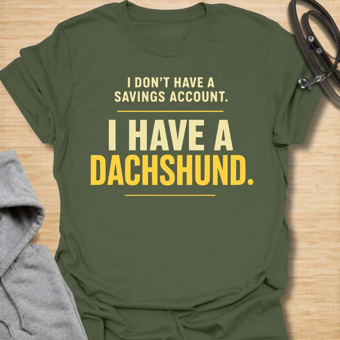 This I Don’t Have A Savings Account I Have A Dachshund t-shirt is made for doxie lovers who know exactly where their money goes. Featuring bold text-only typography with a funny dachshund-owner message, this design has a simple, relatable dog-parent feel that wiener dog fans will instantly understand. Perfect for dachshund moms, dachshund dads, doxie owners, rescue dog lovers, and anyone whose tiny long dog is basically their financial plan.