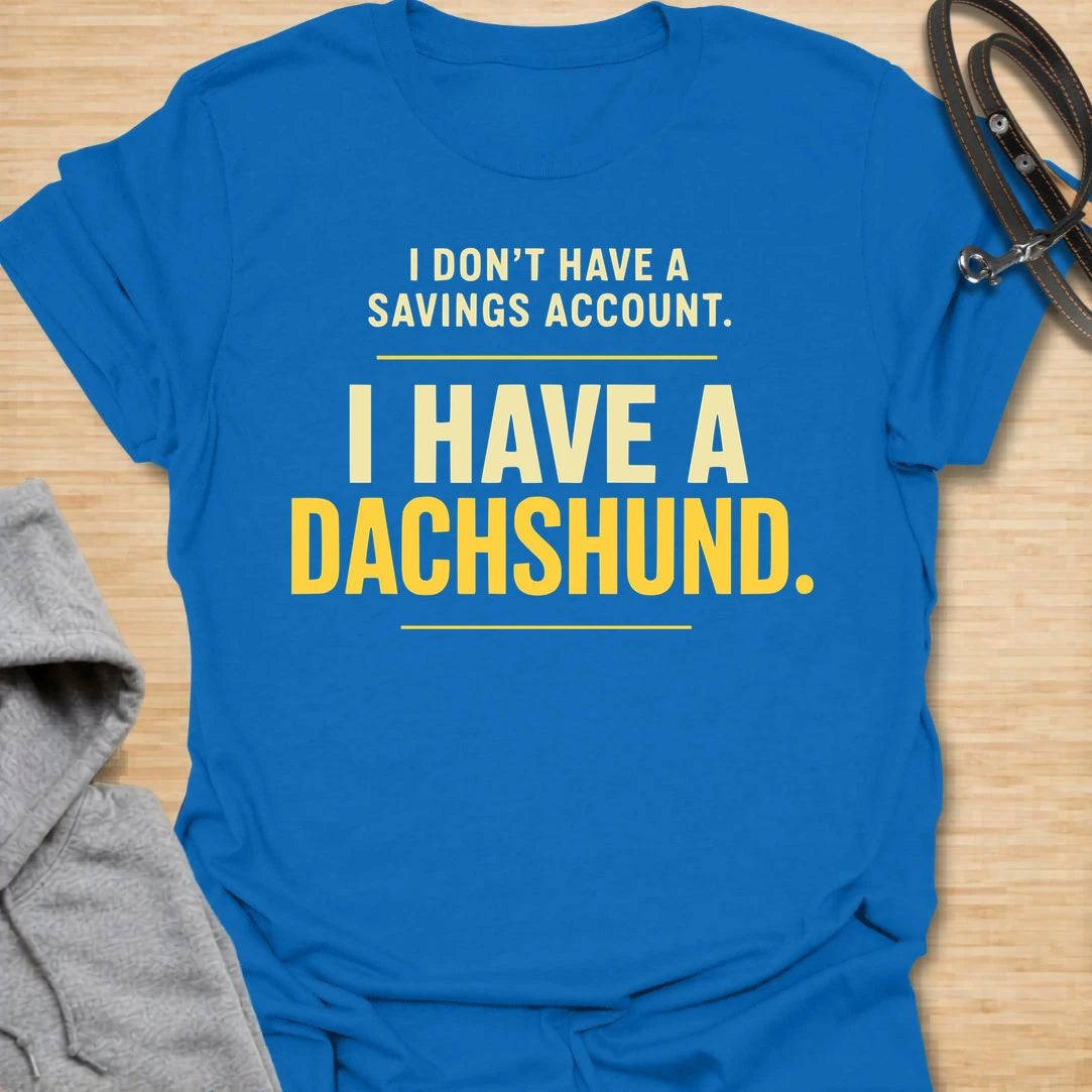 This I Don’t Have A Savings Account I Have A Dachshund t-shirt is made for doxie lovers who know exactly where their money goes. Featuring bold text-only typography with a funny dachshund-owner message, this design has a simple, relatable dog-parent feel that wiener dog fans will instantly understand. Perfect for dachshund moms, dachshund dads, doxie owners, rescue dog lovers, and anyone whose tiny long dog is basically their financial plan.