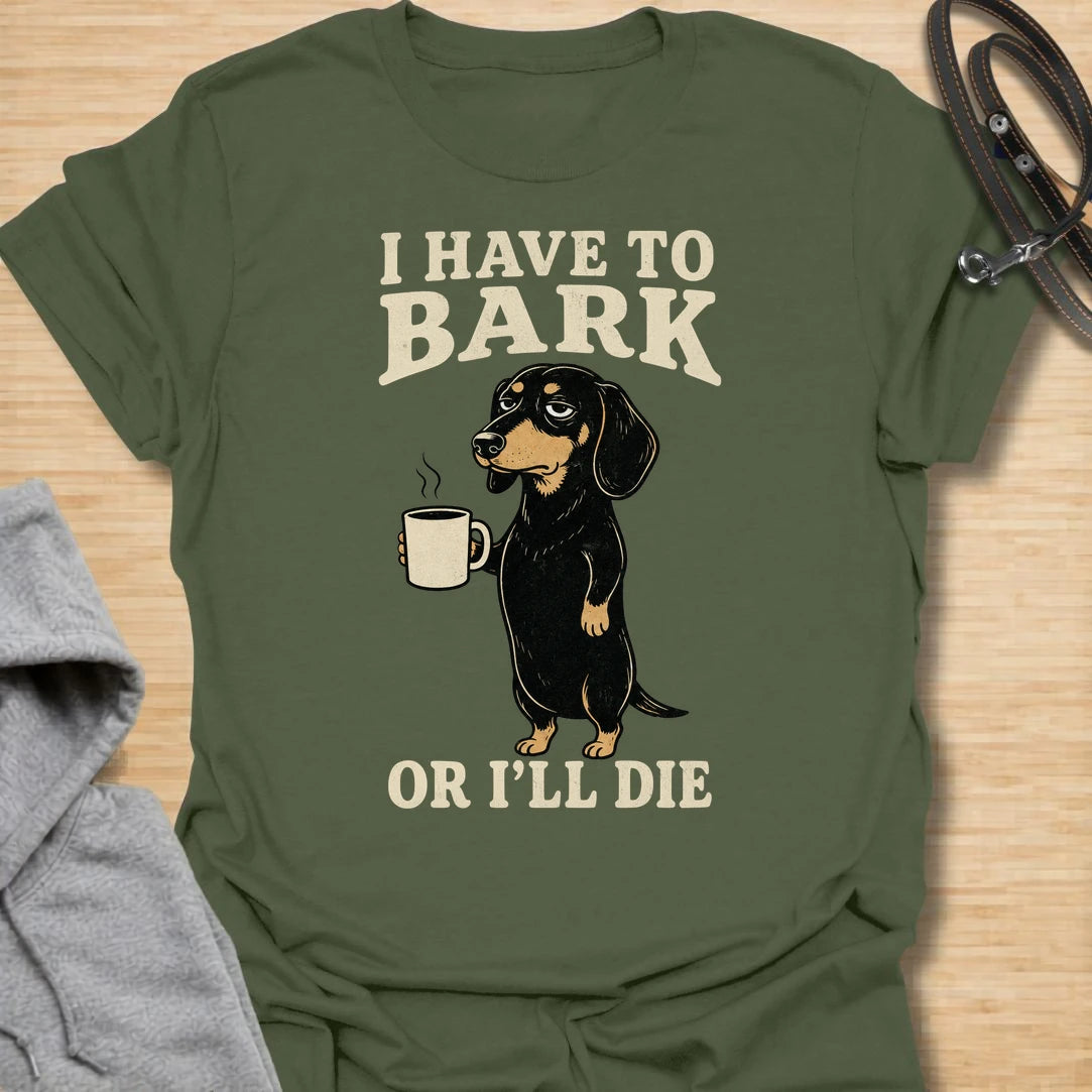 This I Have To Bark Or I’ll Die t-shirt is made for dachshund lovers who know barking is not a hobby, it is a life requirement. Featuring a tired-looking dachshund holding a coffee mug with bold vintage-style text, this design has a funny, dramatic dog-parent feel that doxie owners will instantly understand. Perfect for dachshund moms, dachshund dads, wiener dog fans, rescue dog lovers, coffee lovers, and anyone whose tiny long dog takes noise duty very seriously.