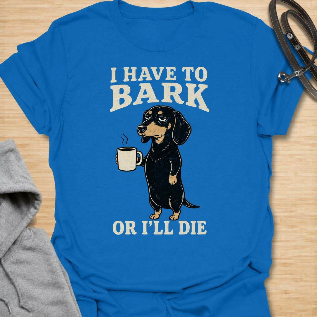 This I Have To Bark Or I’ll Die t-shirt is made for dachshund lovers who know barking is not a hobby, it is a life requirement. Featuring a tired-looking dachshund holding a coffee mug with bold vintage-style text, this design has a funny, dramatic dog-parent feel that doxie owners will instantly understand. Perfect for dachshund moms, dachshund dads, wiener dog fans, rescue dog lovers, coffee lovers, and anyone whose tiny long dog takes noise duty very seriously.