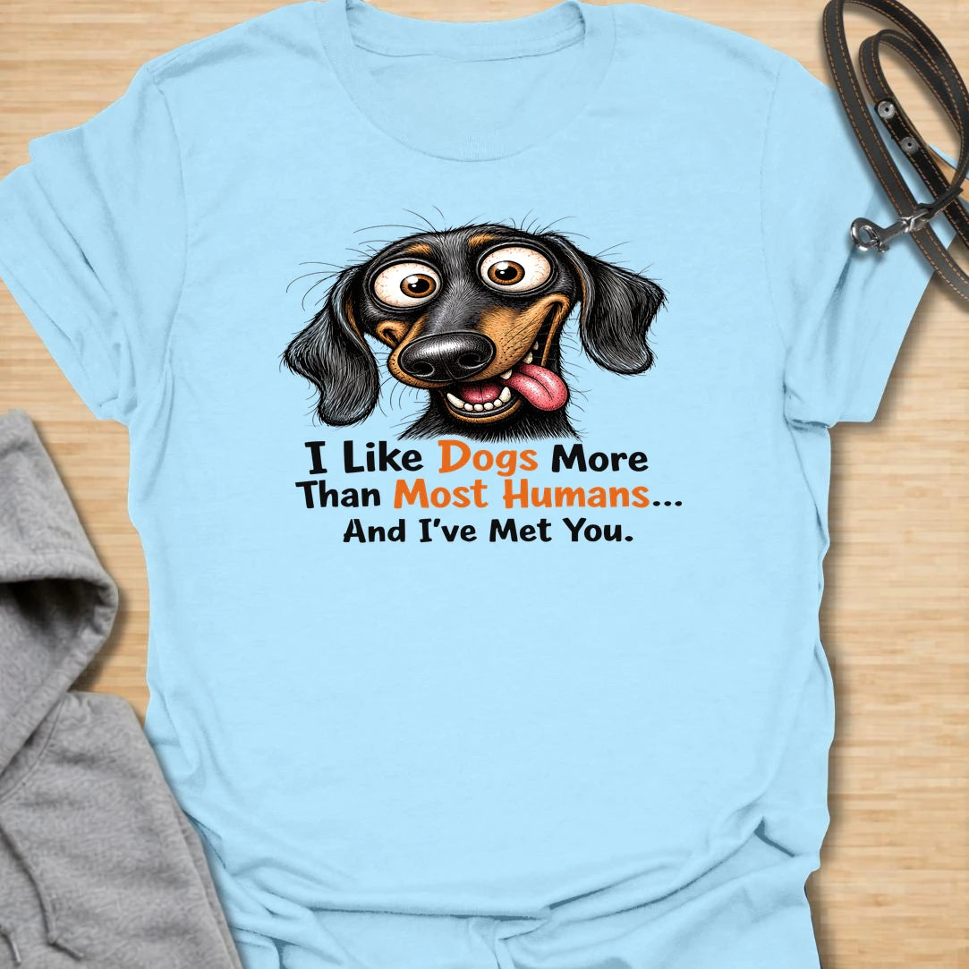 Dogs Over Humans t-shirt for dog lovers who know dogs are easier, kinder, and often much better company. This funny dachshund design says “I Like Dogs More Than Most Humans... And I’ve Met You,” making it perfect for sarcastic pet parents, doxie lovers, and anyone with a strong preference for dogs.