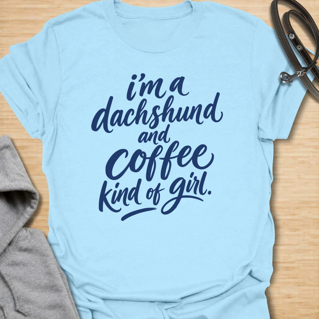Dachshund and Coffee Girl t-shirt for dachshund people who need coffee before conversation. This bold text design is simple, readable, and made for everyday wear. It is perfect for women who love their wiener dog as much as their morning caffeine. A cute gift for doxie moms, sausage dog lovers, and coffee-obsessed dog people.