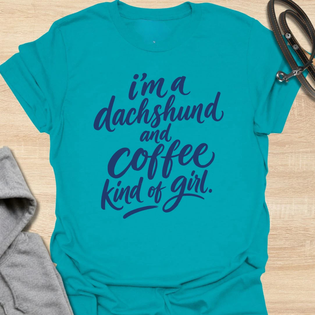 Dachshund and Coffee Girl t-shirt for dachshund people who need coffee before conversation. This bold text design is simple, readable, and made for everyday wear. It is perfect for women who love their wiener dog as much as their morning caffeine. A cute gift for doxie moms, sausage dog lovers, and coffee-obsessed dog people.
