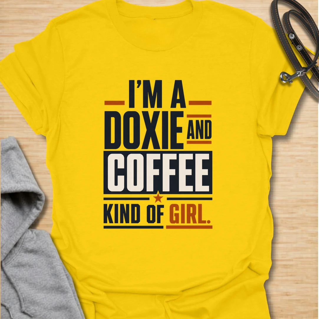 Funny doxie and coffee t-shirt for women who love dachshunds, caffeine, and simple dog mom style. This bold typography design is perfect for dachshund moms, coffee lovers, dog owners, and anyone whose day starts better with a cup of coffee and a doxie nearby. Also available in a matching guy version, making it a fun couple shirt set for dog-loving coffee drinkers. Great for casual wear, dog walks, coffee runs, weekends, or gifting to a dachshund lover.