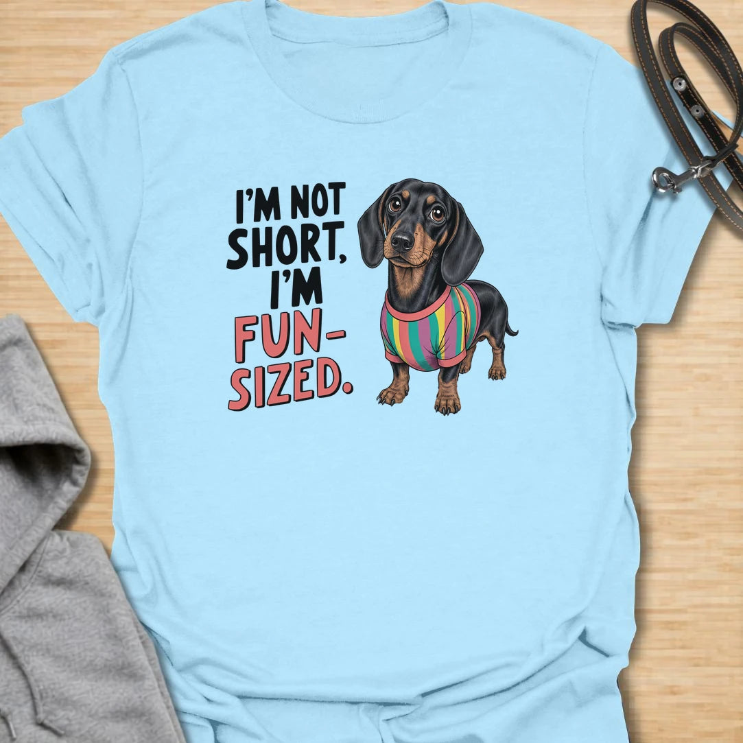Fun Sized Doxie t-shirt for dachshund lovers who know short dogs can have the biggest personalities. This cute design features a dachshund in a colorful shirt with the phrase “I’m Not Short, I’m Fun Sized.” Perfect for sausage dog fans, doxie moms, and anyone who loves small dogs with oversized charm.