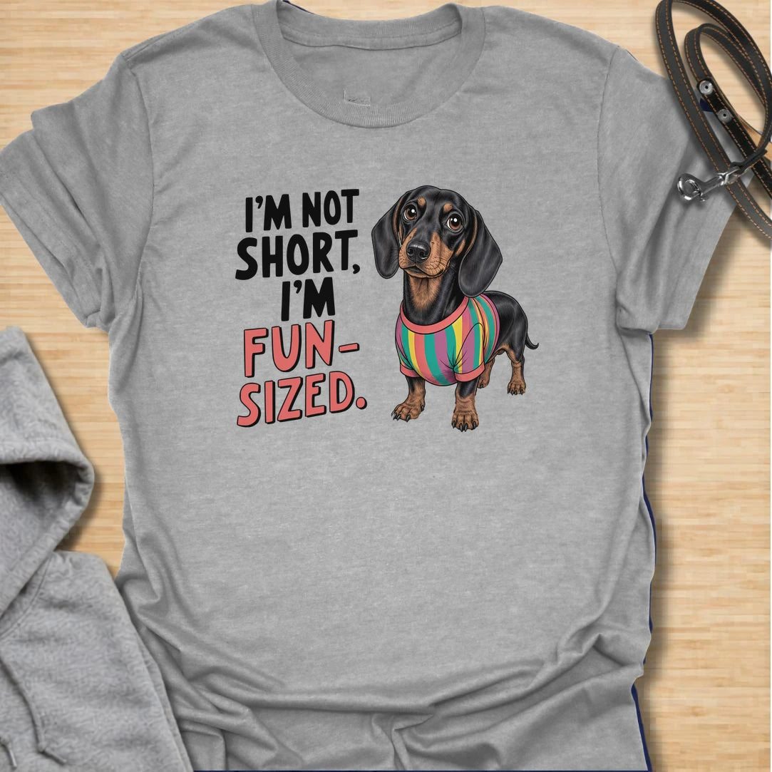 Fun Sized Doxie t-shirt for dachshund lovers who know short dogs can have the biggest personalities. This cute design features a dachshund in a colorful shirt with the phrase “I’m Not Short, I’m Fun Sized.” Perfect for sausage dog fans, doxie moms, and anyone who loves small dogs with oversized charm.