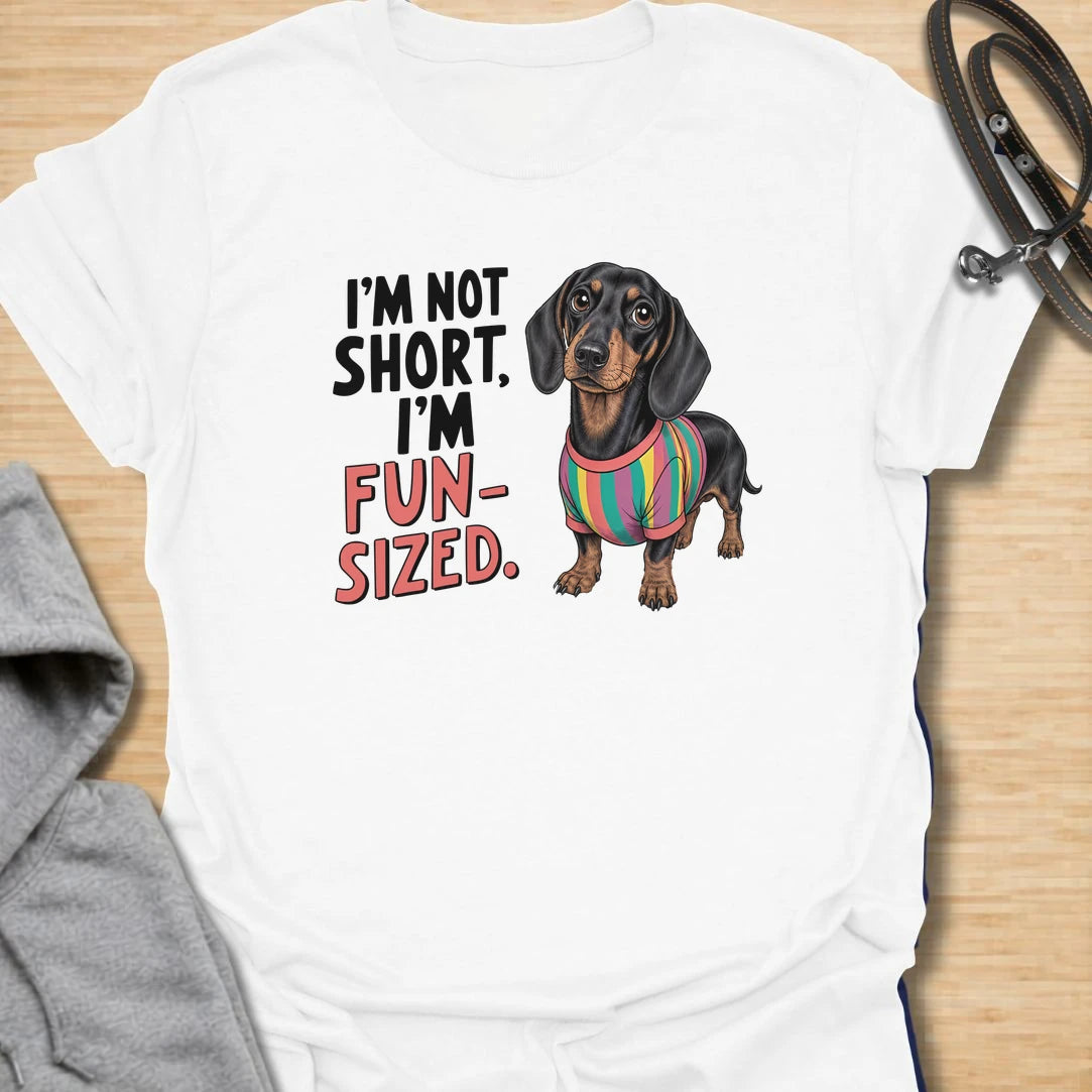Fun Sized Doxie t-shirt for dachshund lovers who know short dogs can have the biggest personalities. This cute design features a dachshund in a colorful shirt with the phrase “I’m Not Short, I’m Fun Sized.” Perfect for sausage dog fans, doxie moms, and anyone who loves small dogs with oversized charm.