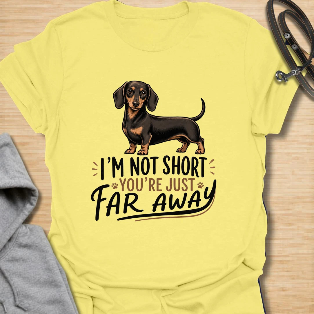 Funny dachshund t-shirt for anyone who knows sausage dogs are not short, everyone else is just far away. This cute design features a classic black and tan dachshund with bold playful lettering. A great gift for dachshund moms, dachshund dads, doxie lovers, wiener dog fans, and anyone who loves small dogs with big personality. Perfect for dog walks, casual weekends, breed meetups, or everyday dachshund-owner humor.