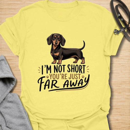 Funny dachshund t-shirt for anyone who knows sausage dogs are not short, everyone else is just far away. This cute design features a classic black and tan dachshund with bold playful lettering. A great gift for dachshund moms, dachshund dads, doxie lovers, wiener dog fans, and anyone who loves small dogs with big personality. Perfect for dog walks, casual weekends, breed meetups, or everyday dachshund-owner humor.